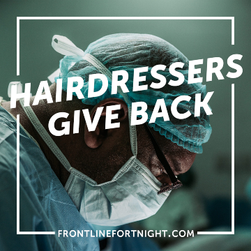 Doctor in full PPE working on a patient